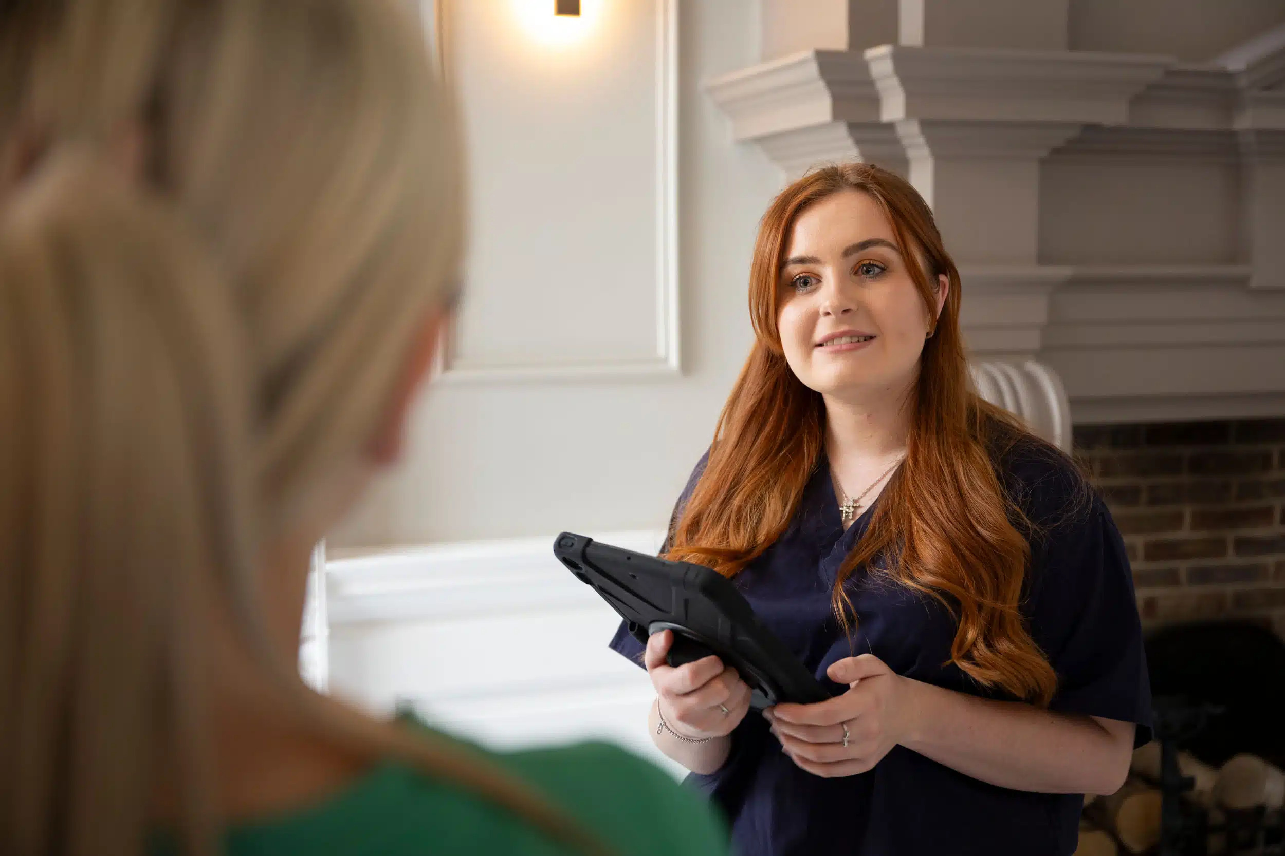 Consultant speaking with patient